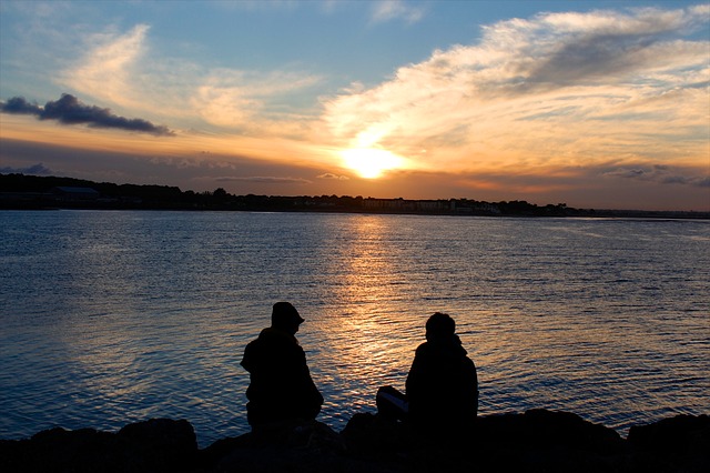 couplelovers at serene calm peace sea sunset sunrise